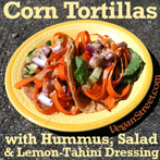 Corn tortillas with hummus and salad